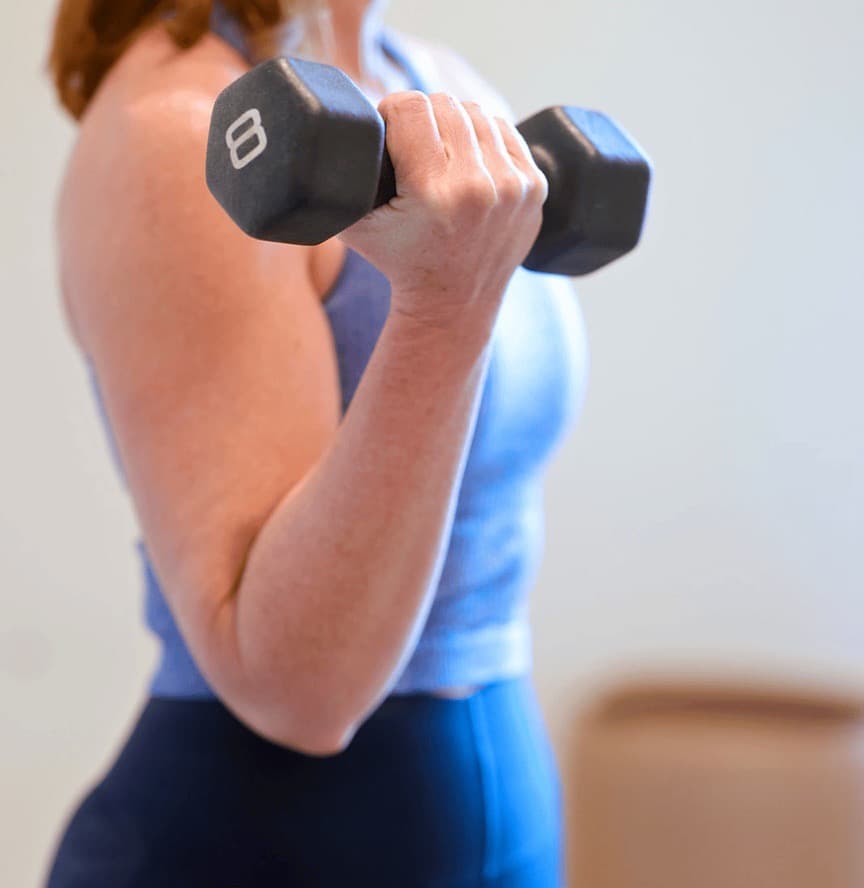 Two women resting after a workout
