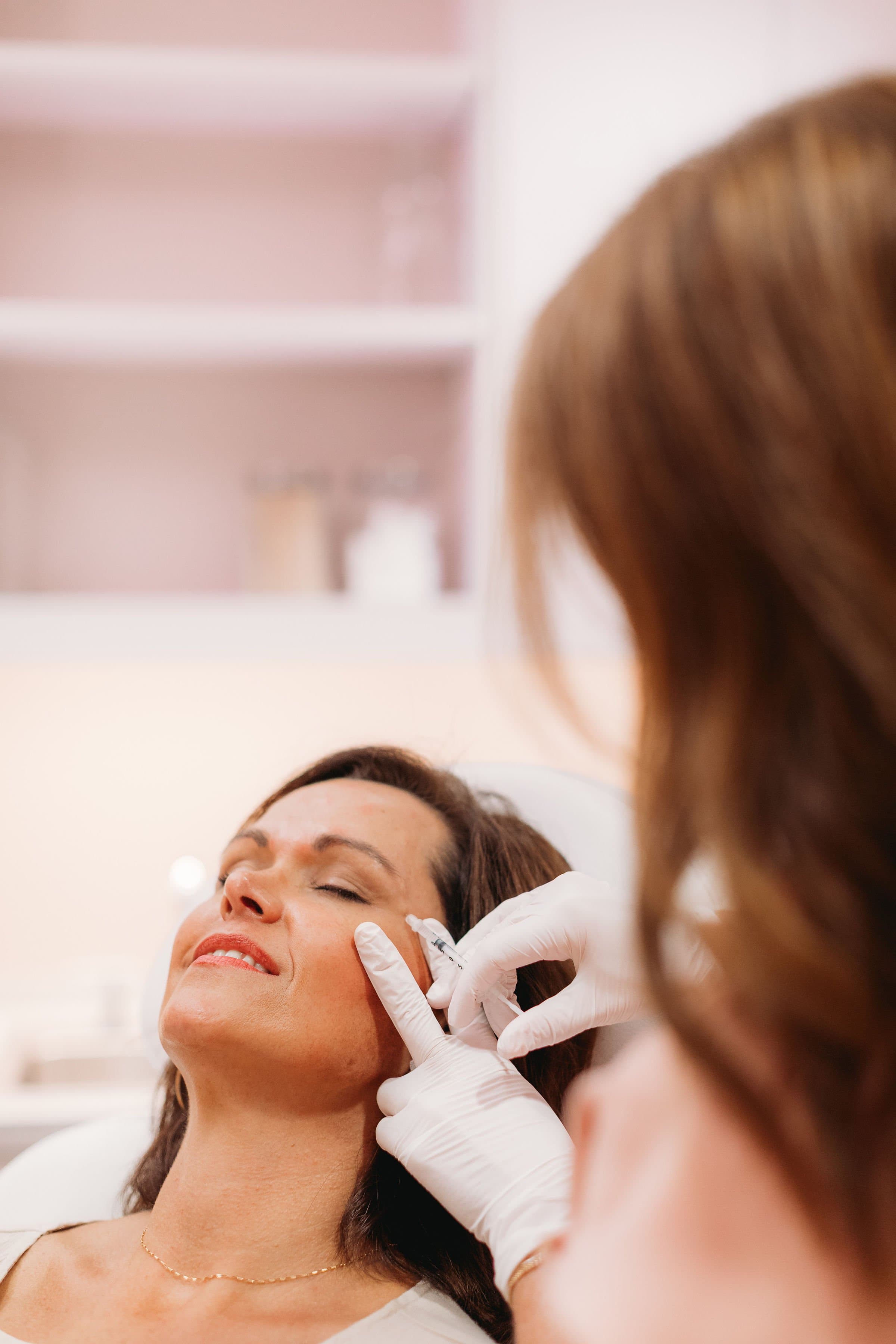 A provider performing an injectable neuromodulator treatment